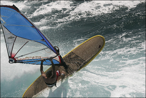 Na SUP'ie można pływać również z żaglem - Longboard Windsurfing